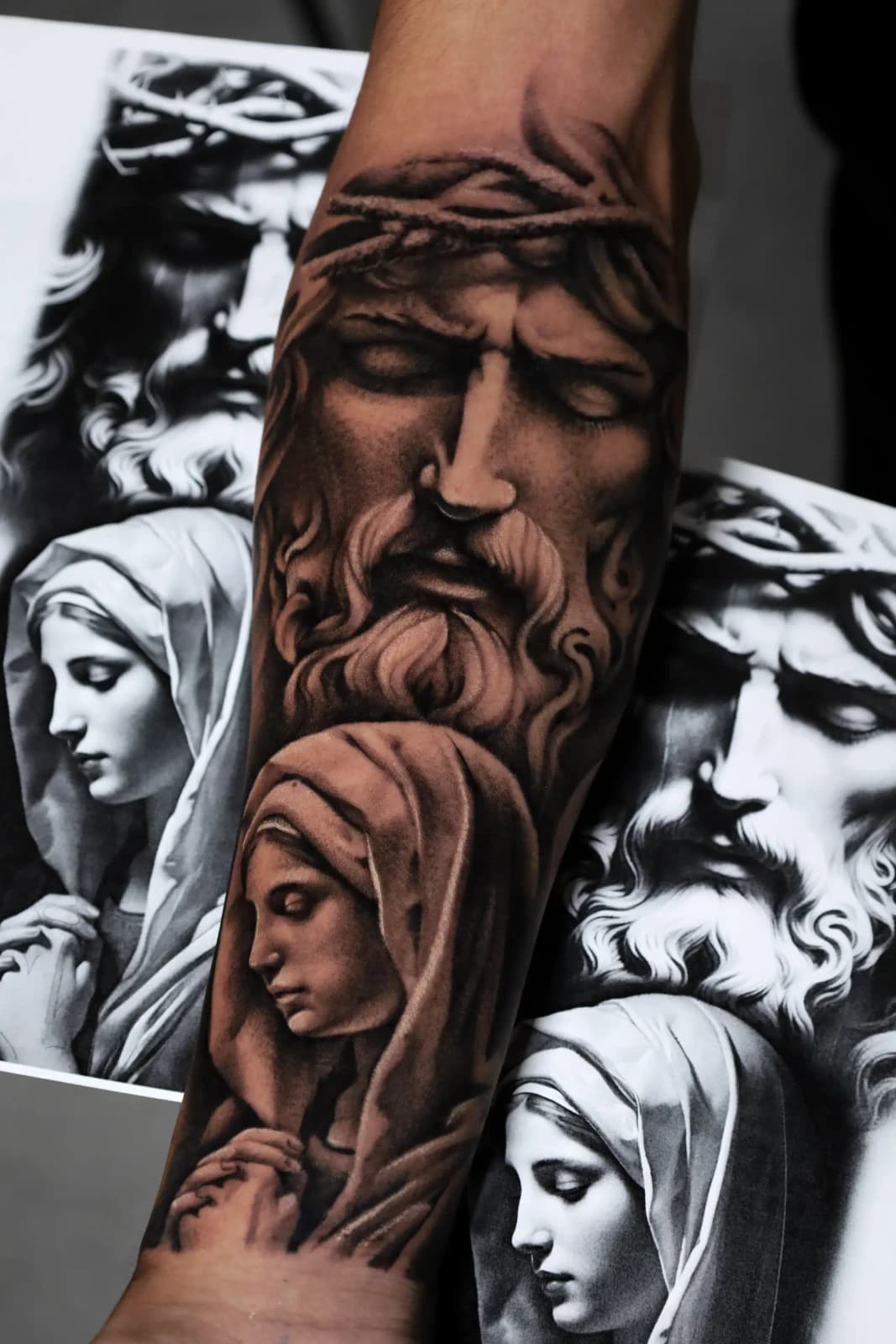 Religious realism sleeve tattoo