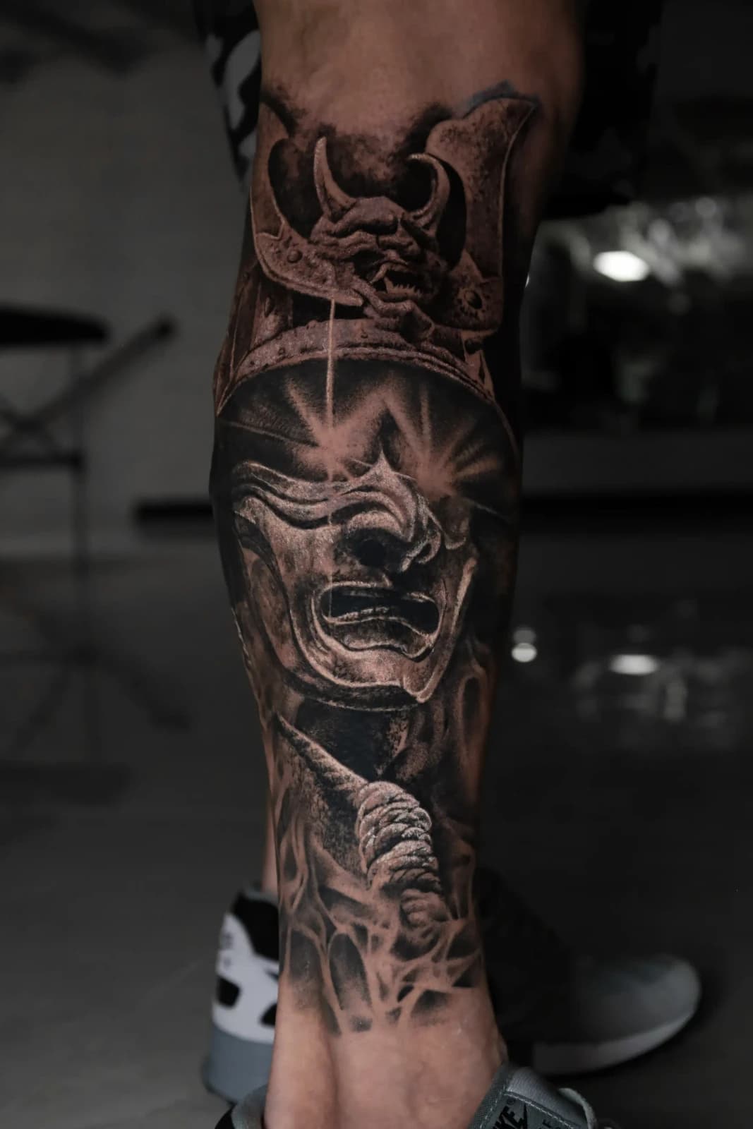 Samurai oni mask sleeve tattoo